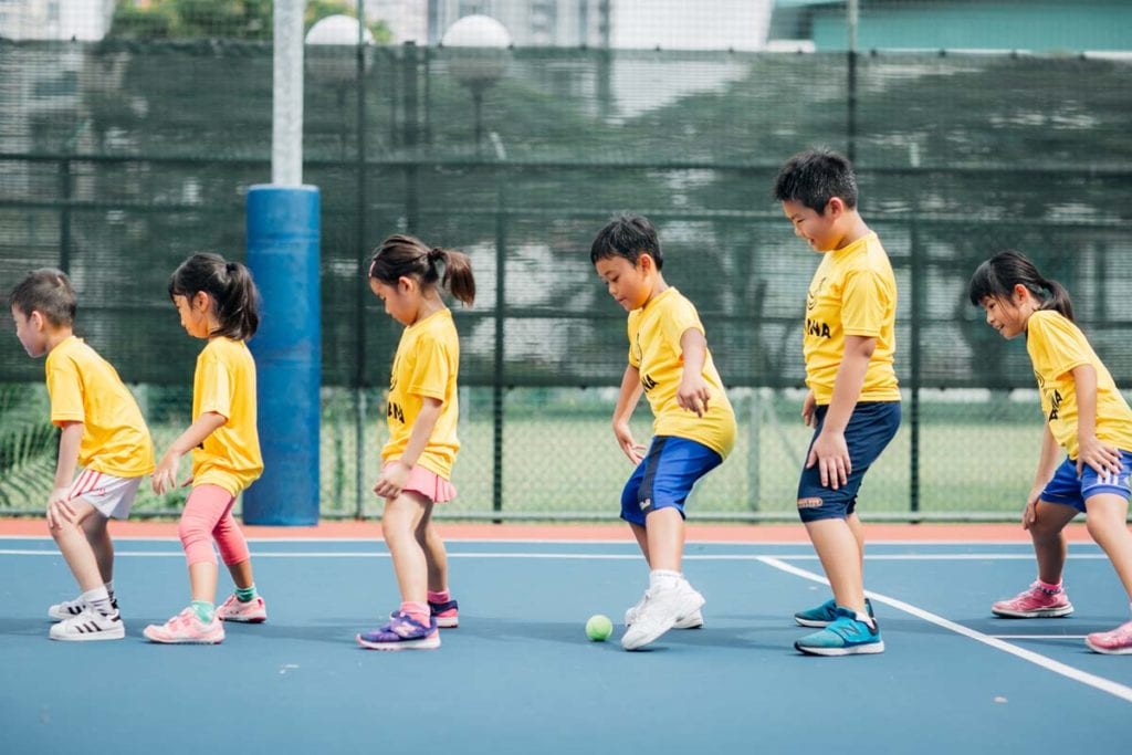 Group tennis lessons for kids