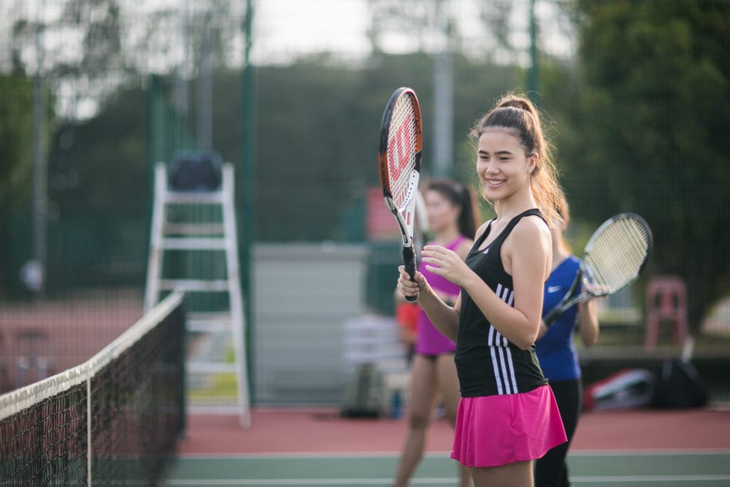 Adult group tennis lessons